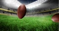 Animation of rugby balls bouncing on grass over sports stadium