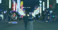 Animation of speedometers over blurred people walking on street in city