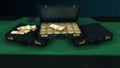 Animation of three black suitcases with combination lock and stacks of dollars lying on the table with green cover and Royalty Free Stock Photo