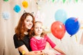 Animator with cute girl playing with balloons