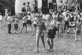 Animators on stage entertain children at the festival day of the village of Kamennomostsky in the autumn park black and white phot Royalty Free Stock Photo