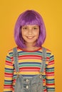 Anime fan. Cosplay kids party. Child cute cosplayer. Cosplay outfit. Otaku girl in wig smiling on yellow background Royalty Free Stock Photo