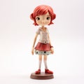 Cartoon Female Figurine With Red Hair And Skirt