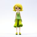 Anime-inspired Blond Female Character Figurine In Green Dress