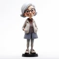 Anime-inspired Elderly Woman Figurine - Playful Cartoons Studio Portrait Royalty Free Stock Photo