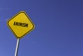 Animism - yellow sign with blue sky background