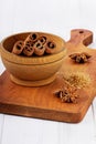 Anise star and cinnamon sticks on brown cane sugar Royalty Free Stock Photo