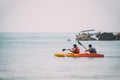 Anjadip, Goa, India - February 16, 2020: Two Men Floating In Arabian Sea Kayaking In Summer Sunny Day