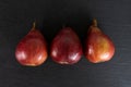 Anjou red pear on grey stone Royalty Free Stock Photo