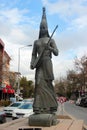 Ankara, Turkey - April 19, 2022: Statue of traditionally dressed Kazakhstan woman with dombra, the Kazakh musical instrument. Gift