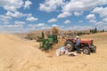 Ankara/Turkey-August 09 2020: .Traditional haymaking with tractors and thresher Royalty Free Stock Photo