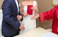 Ankara/Turkey- December 12 2014: Marriage registrar congratulates new couple and gives the family registry to the bride Royalty Free Stock Photo