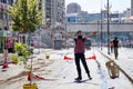 A protester holding a paint spray shows sign of strength gesture on the street during Gezi park protests in Ankara, Turkey