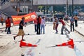 Protesters carrying a banner struggling against the police water cannon while it shoots high velocity stream of water during Gezi