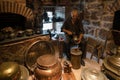Ankara, Turkey - March 26 2022:  A Wax statue of copper smith making a copper pitcher Royalty Free Stock Photo
