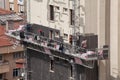 Ankara, Turkey-March 31, 2012: Workers installing external wall thermal insulation with rock wool for energy efficiency.