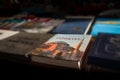 Ankara, Turkey - November 21 2021: Blurred books and magazines at the flea market on sale. Book about Turkey is on sale at the