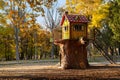 Ankara/Turkey-November 24 2018: Kurtulus Parki in Autumn and a beautiful tree house on a big log
