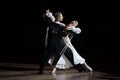 A Beutiful Photo of a Dancing Couple at a WDSF Ballroom Competition