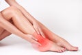 Ankle pain. Female legs. Woman massaging her ankle Royalty Free Stock Photo