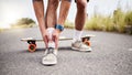 Ankle pain, injury and skater with ache or hurt foot while skating on the road or street as extreme sport. Exercise
