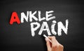 Ankle pain text on blackboard