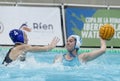 Anna EsparL of CN Sabadell vies with Alejandra AznarR of CN S. Andreu