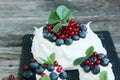 Anna Pavlova dessert with blueberries and red currants Royalty Free Stock Photo