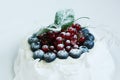 Anna Pavlova dessert with blueberries and red currants Royalty Free Stock Photo