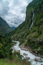 annapurna circuit nepal waterfall stream on the trekking famous path trail vertical shot Royalty Free Stock Photo