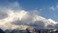 Annapurna III peak appearing behind the clouds  Annapurna Circuit  Nepal Royalty Free Stock Photo