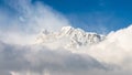 Annapurna III peak appearing behind the clouds  Annapurna Circuit  Nepal Royalty Free Stock Photo