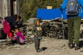 Annapurna, Nepal - November 8, 2015: Nepalese children see the tourist in a village along the Annapurna circuit trek