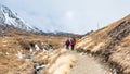 Annapurna, Nepal - November 09, 2018: Tourists going up on the way to Annapurna Base Camp, Himalayas, Nepal. Royalty Free Stock Photo