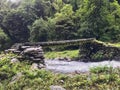 Annupurna trekking region, Nepal, bridge over river, constructed of stone and timber