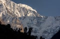 Annapurna South snowcapped mountain summit and glacier against blue sky