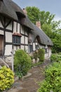 Anne Hathaway`s William Shakespeare`s wife famous thatched cottage and garden at Shottery, just outside Stratford upon Avon, En Royalty Free Stock Photo