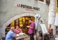 Waiter near senior couple placing order at the Le Potron Mine