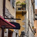 Alley in medieval historic town Annecy with buildings Royalty Free Stock Photo