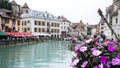 Annecy, France - September 9, 2021: the view of city canal with medieval buildings in Annecy Old Town, Restaurant near the River T Royalty Free Stock Photo