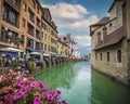 Annecy, France - September 9, 2021: the view of city canal with medieval buildings in Annecy Old Town, Restaurant near the River T Royalty Free Stock Photo