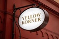 YellowKorner logo sign and brand text Yellow Korner chain shop facade of limited edition art