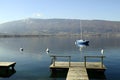 Annecy lake, quiet view with sailboat, Savoy, France Royalty Free Stock Photo
