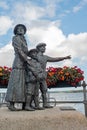 The Annie Moore Memorial in Cobh, county Cork, sky in the background