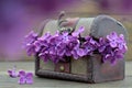 Anniversary card with lilac flowers in vintage chest Royalty Free Stock Photo