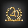 20 anniversary golden symbol. Golden laurel wreaths with ribbons and twentieth anniversary year symbol on dark