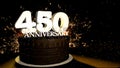 Anniversary 450 greeting card. Chocolate cake decorated with colored dragees with white numbers on a wooden table with fireworks
