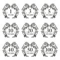 Anniversary icon set. Anniversary symbols in ornate frame with floral elements. 1,3,5,10,20,30,40,50,100 years. Template for cards