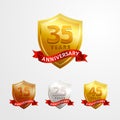 Anniversary logo badge vector design. Set of Shinny golden, silver, bronze shield with ribbon for birthday event celebration Royalty Free Stock Photo