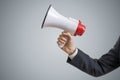 Announcement concept. Hand holds megaphone Royalty Free Stock Photo